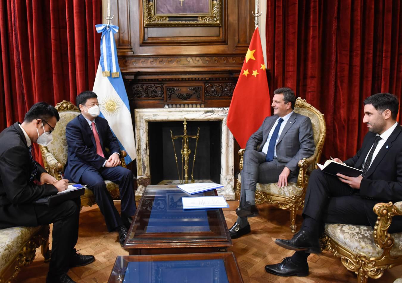 Zou Xiaoli y Sergio Massa