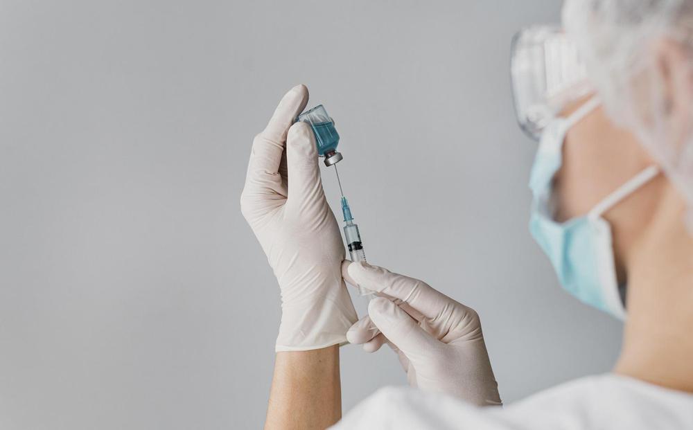 doctor-holding-syringe-for-vaccine