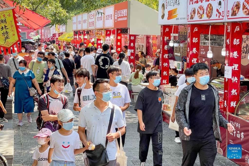 Gente en las calles de China. (Foto:Xinhua)